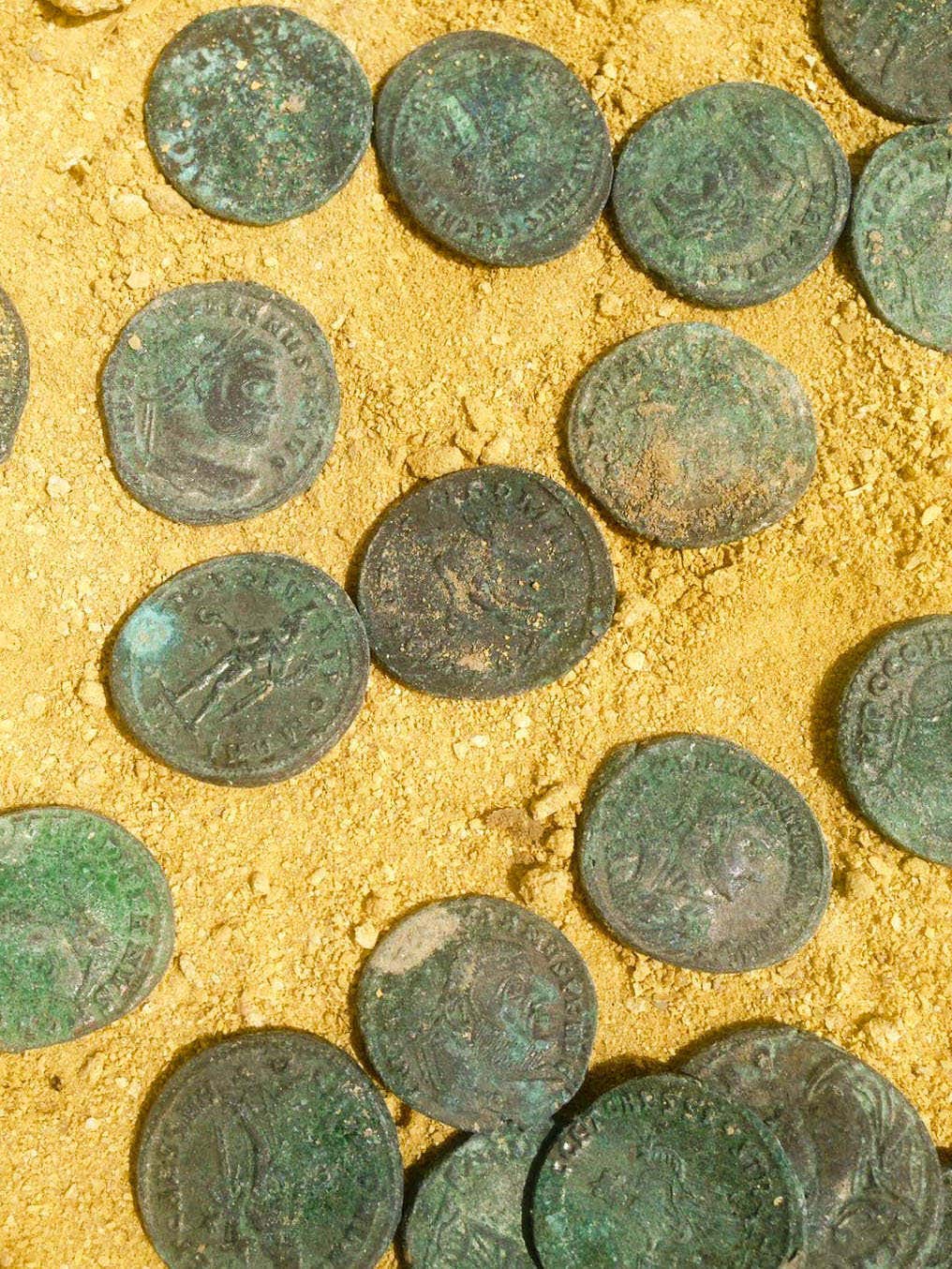 Workers unearth large trove of Roman coins at Spanish park