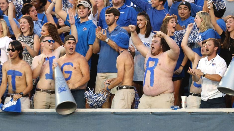 No shirt alert Memphis fan playing air guitar won't be mistaken for