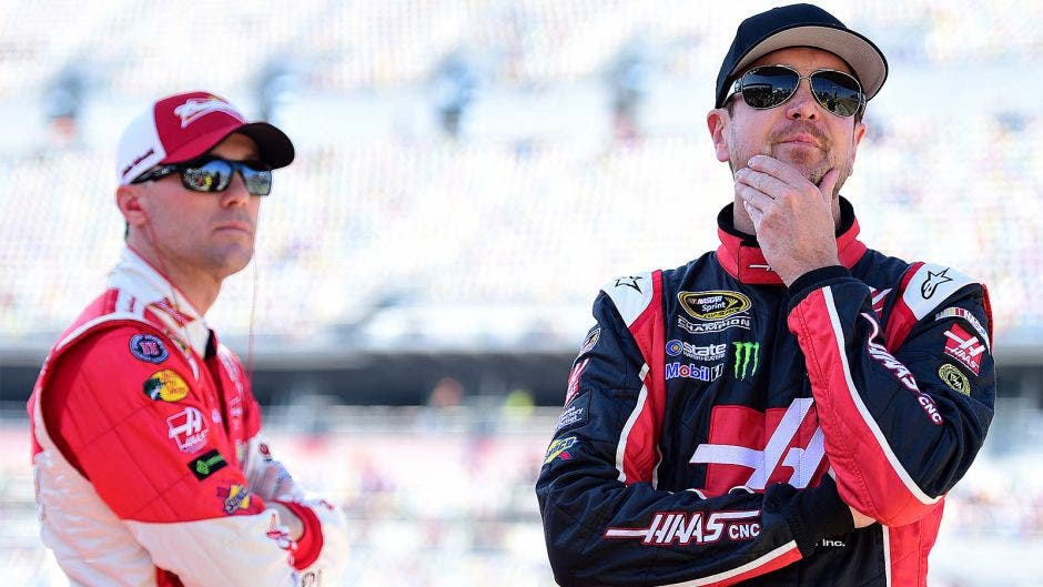 Kevin Harvick, driver of the Mobil 1 Chevrolet, stands on the grid