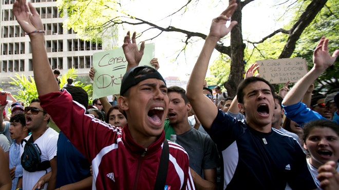 Dualing Protests Raise Fears Of More Violence In Venezuela As Maduro ...