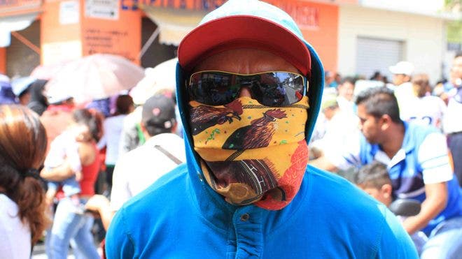 Iguala residents take to the streets imploring: ‘We want the students back alive!’