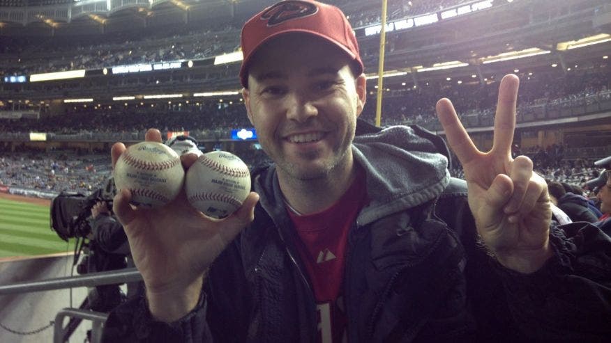 Fan presents 3,000th hit ball to A-Rod