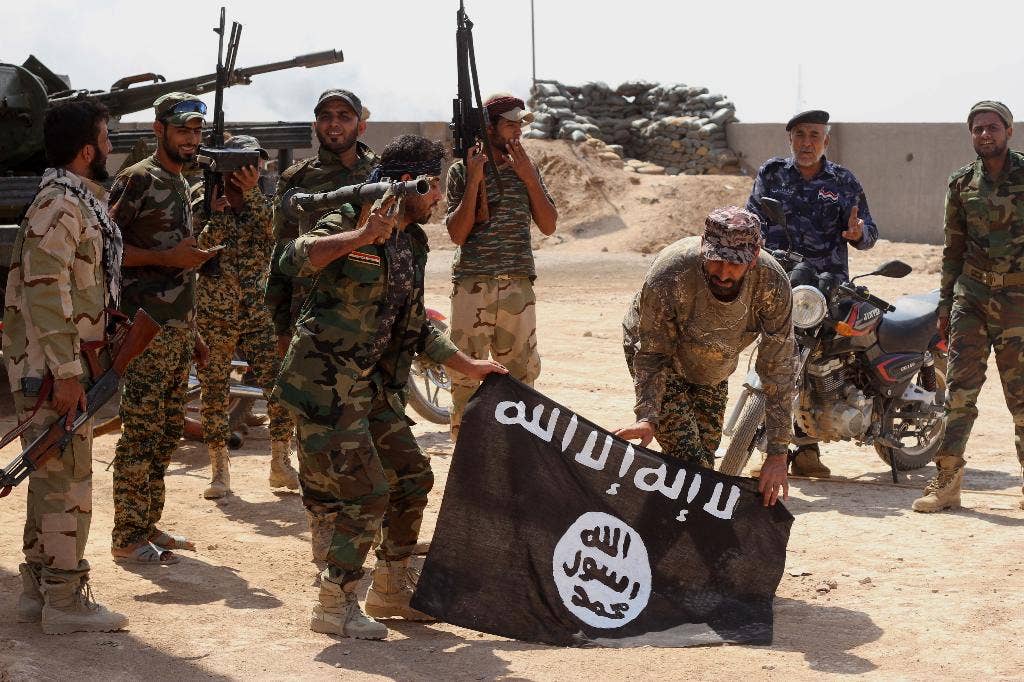 Amnesty International: Islamic State group carried out war crimes ...