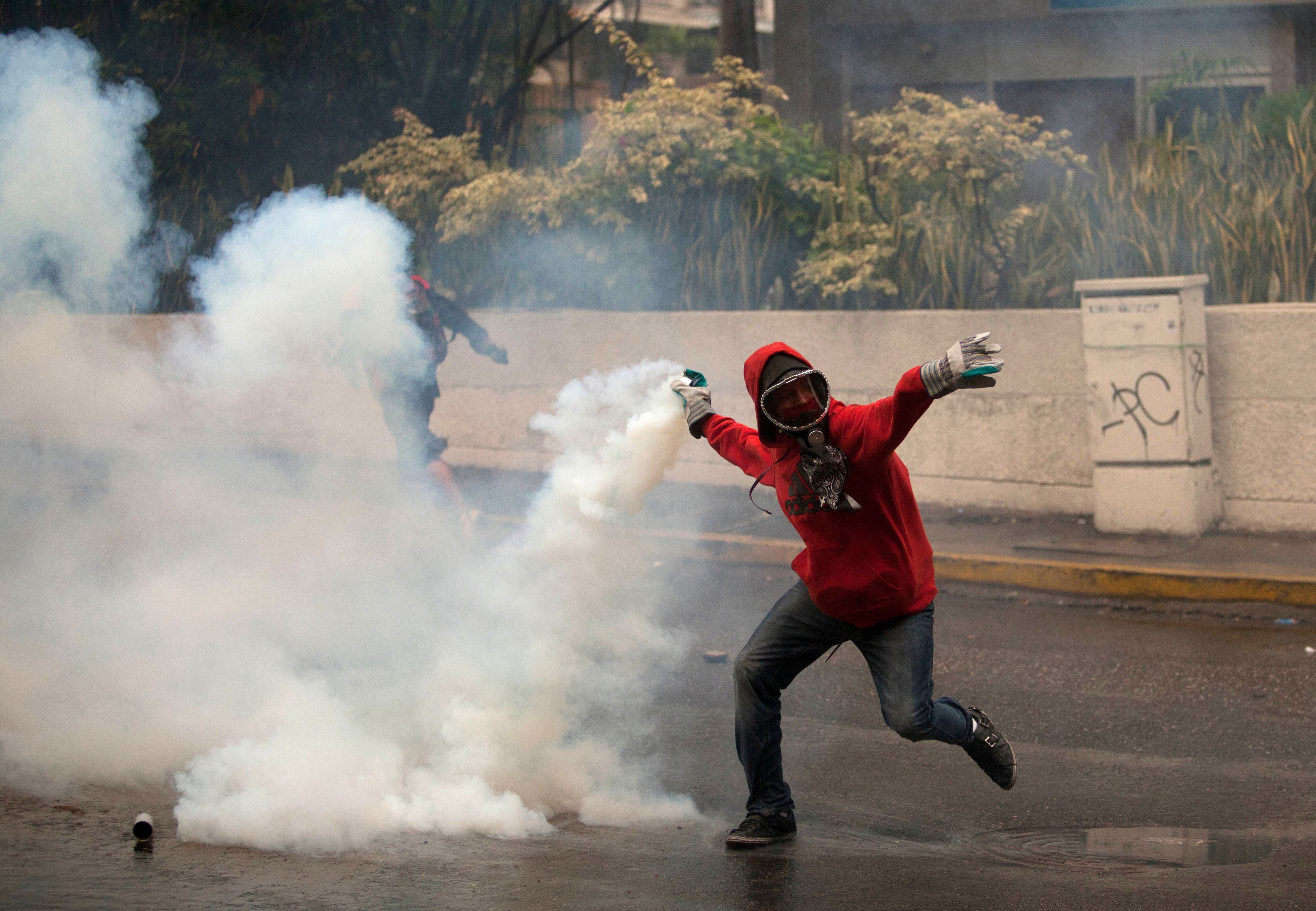 Venezuelan Security Forces Break Up Protest Camps