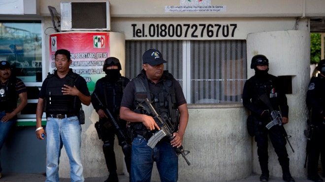 Federal forces take over Mexican town after police accused of student ...