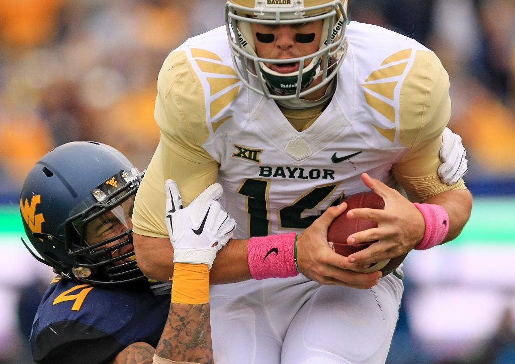 Gol penalti membantu Baylor, tidak. 4, mengakhiri musim tak terkalahkannya dengan kekalahan 41-27 dari West Virginia