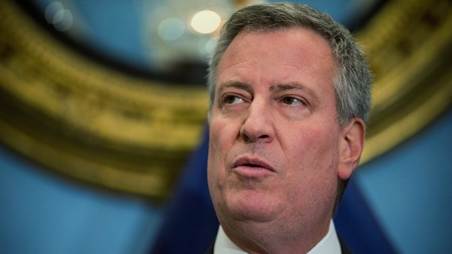 NYC's de Blasio mum after NYPD cops seen on video being harassed