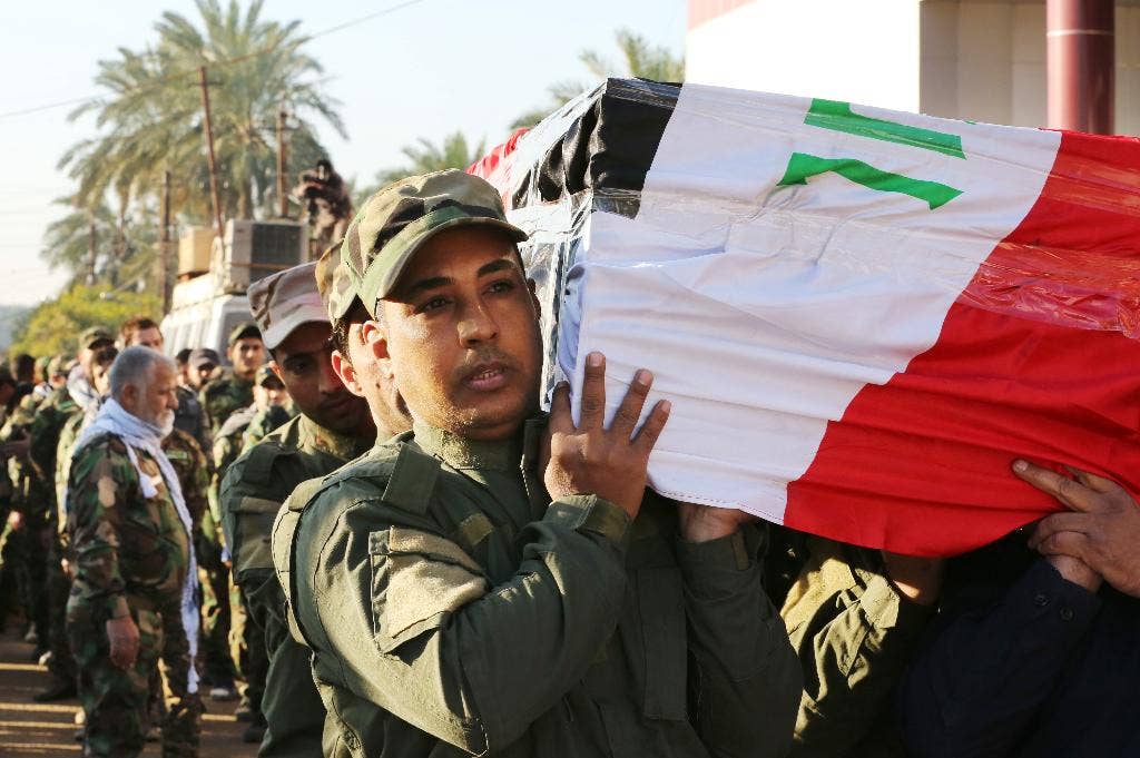 Islamic State group claims suicide attack north of Baghdad that killed ...