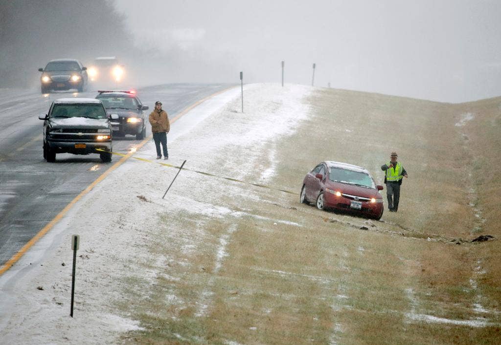The Latest: Police say man pulls unloaded gun on snow plow driver ...