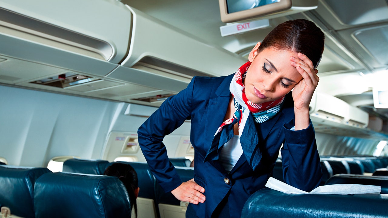 Flight attendants worry about their personal safety while wearing