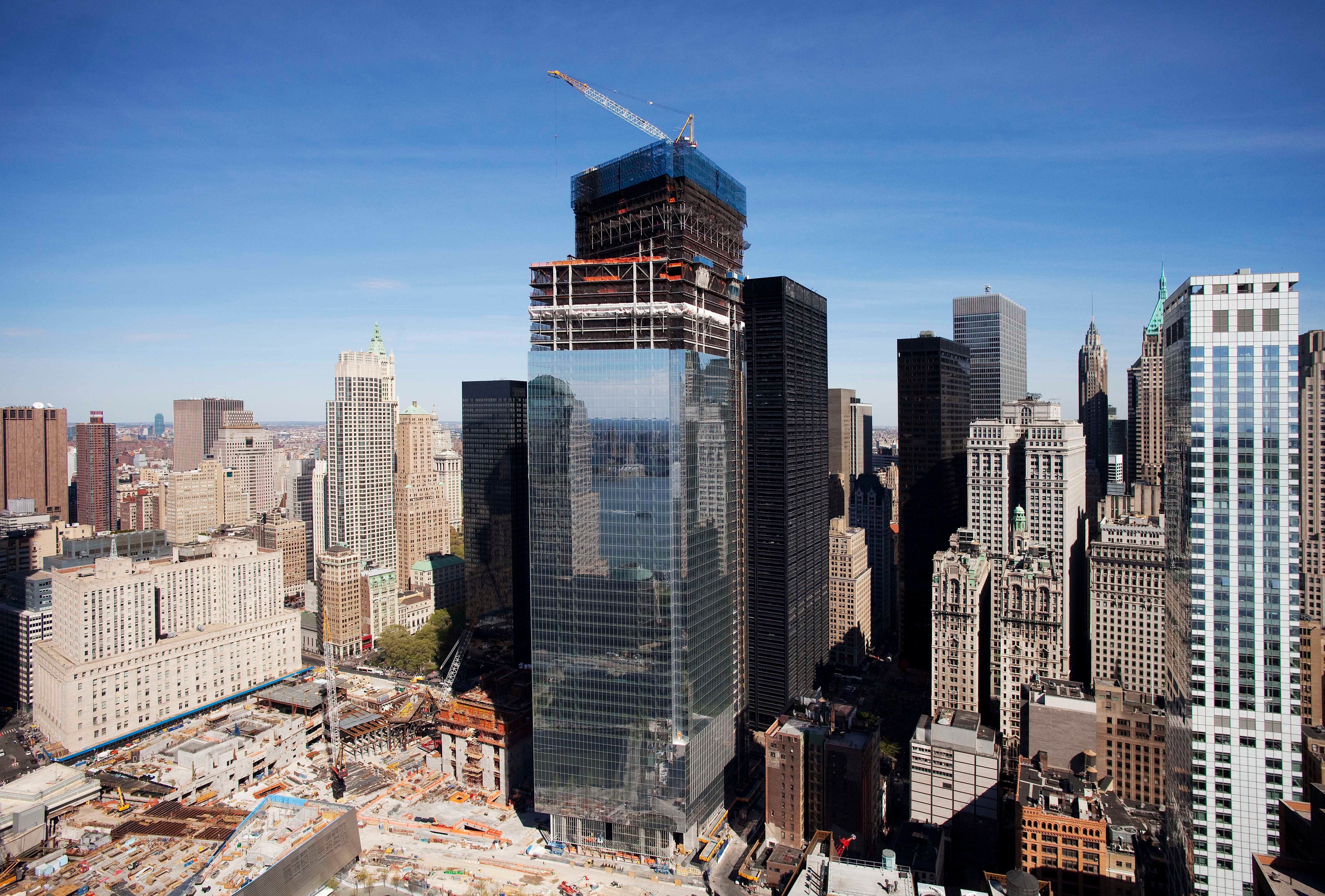 Final steel beam placed atop 4 WTC tower