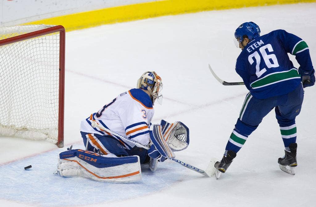 Etem mencetak pemenang pertandingan adu penalti saat Canucks mengalahkan Oilers 4-3