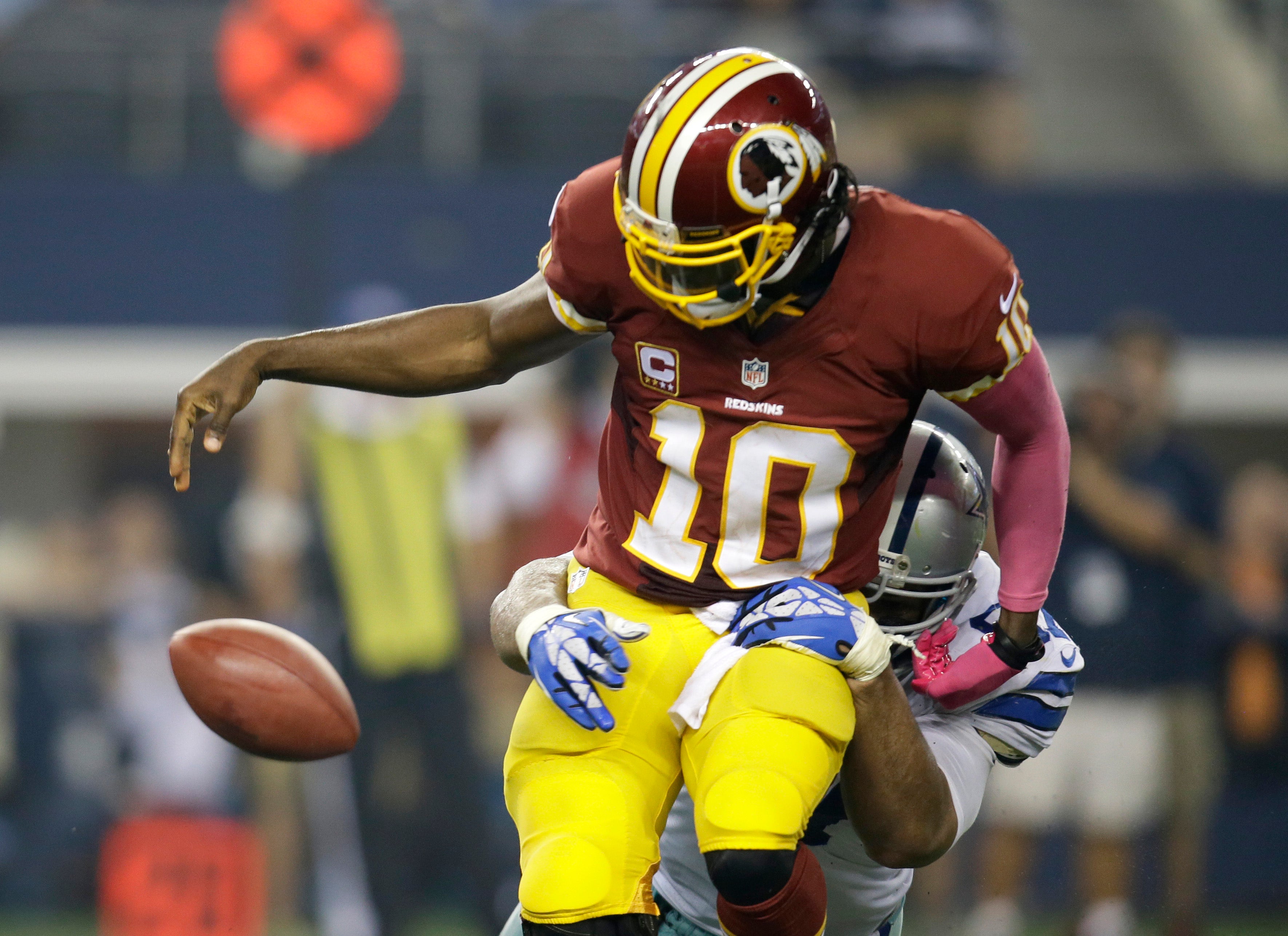 Washington Redskins' Robert Griffin III is sacked in the 1st