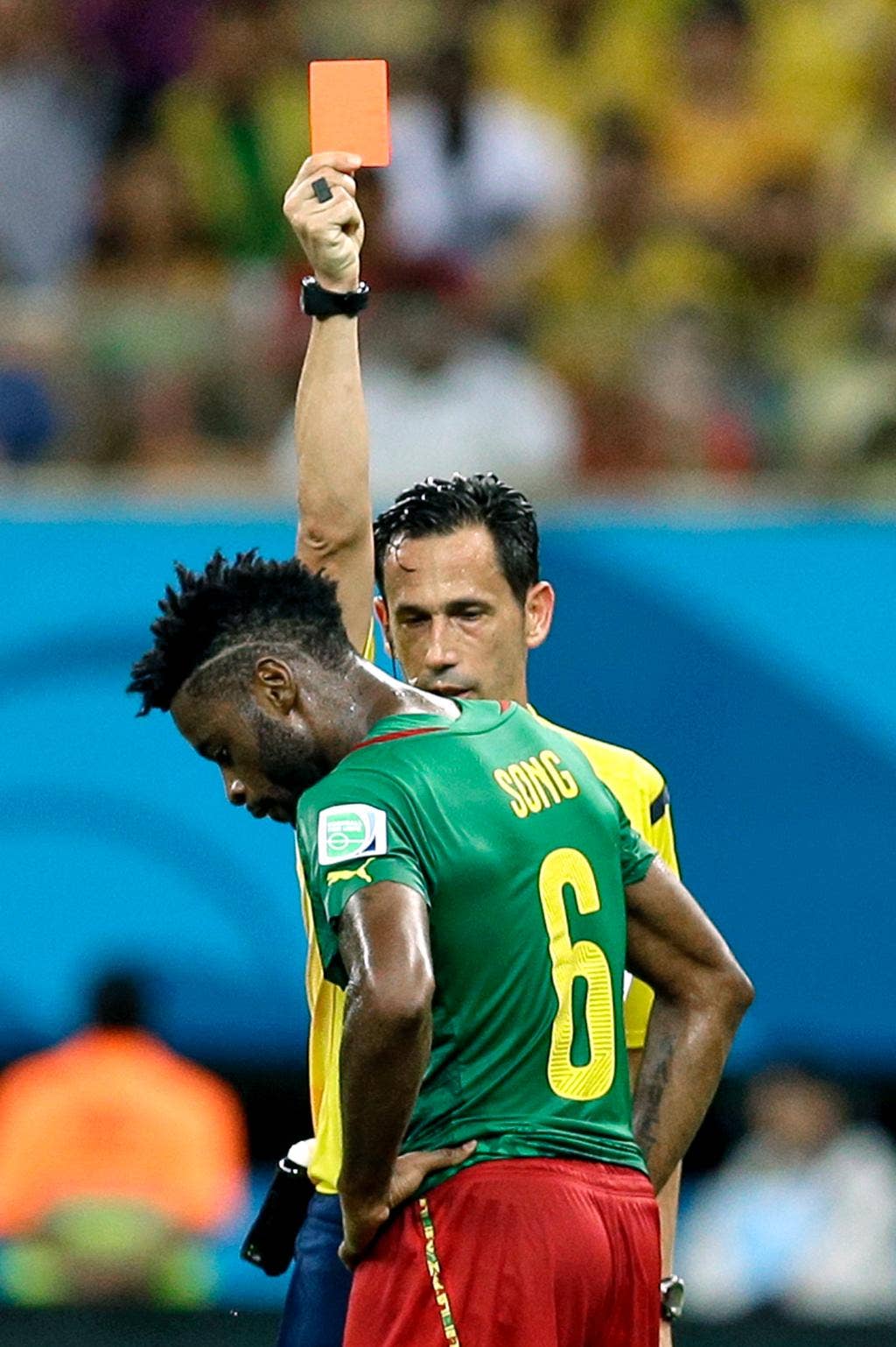 With infighting and inexplicable red card, Cameroon eliminated from