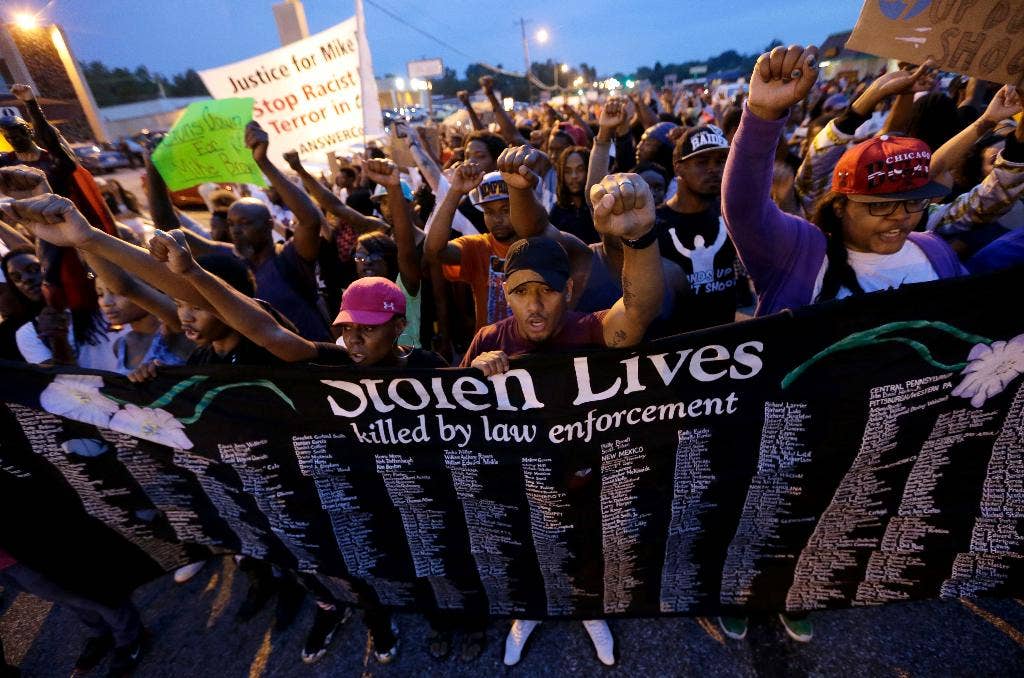 Police begin to impose curfew in St. Louis suburb where black teen ...