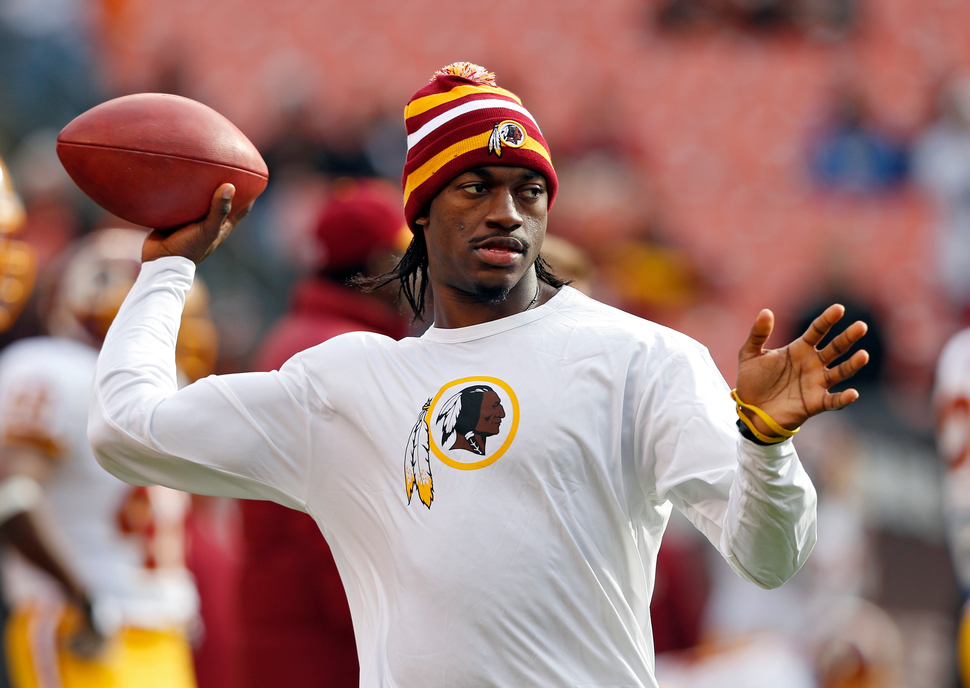 Redskins' RG3 returns to practice