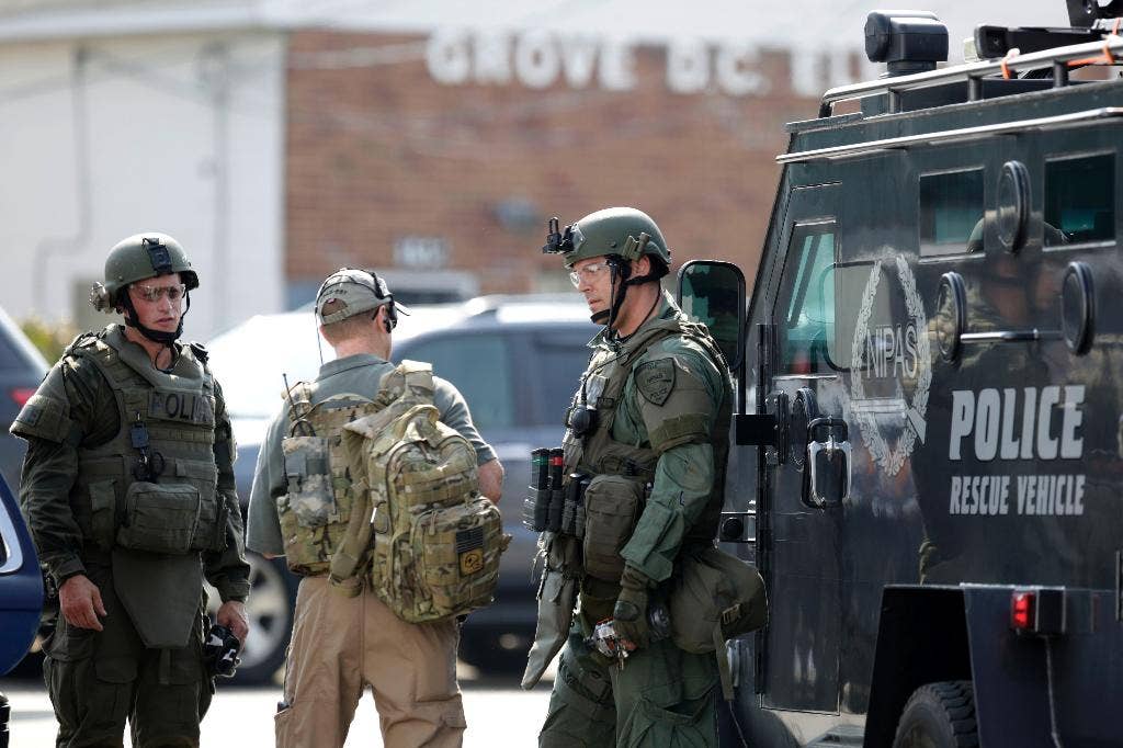 Officer Shooting Prompts Manhunt, School Shutdown In Northern Illinois 