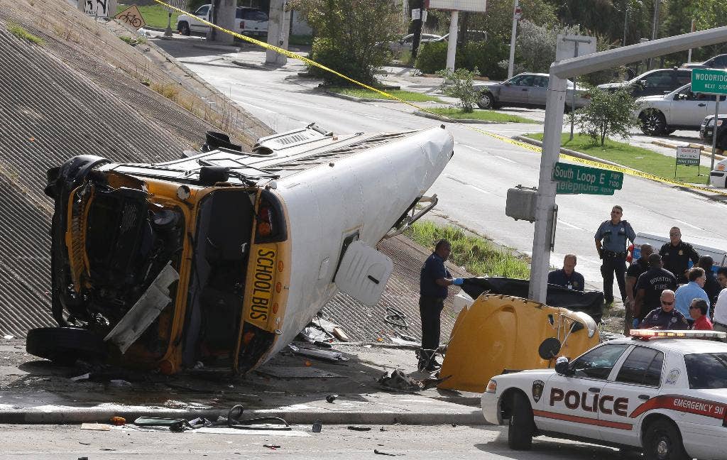 2 students die after school bus rolls off highway overpass in Houston ...