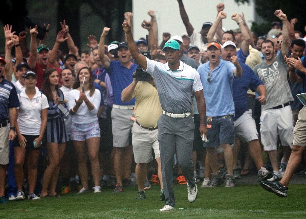 Tiger Woods opens Wyndham Championship with 64, best round in 2 years