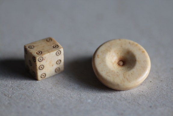 Board game pieces found in settlement built on Roman military fort