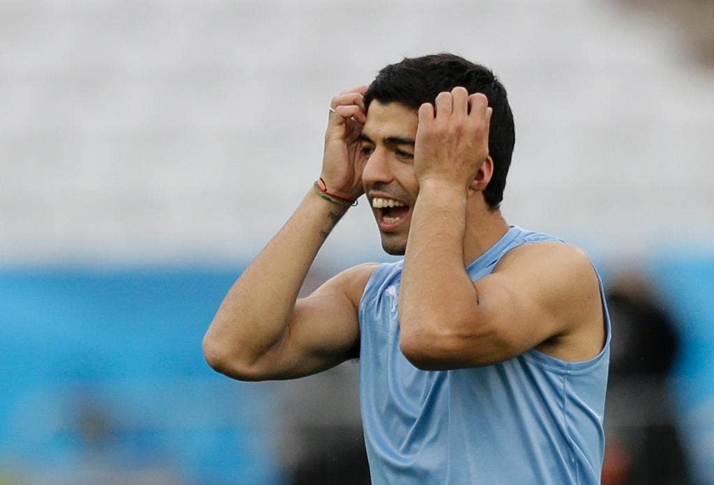 Suarez akan menjadi untuk Uruguay, dan target pembela Inggris di Grup Piala Dunia D