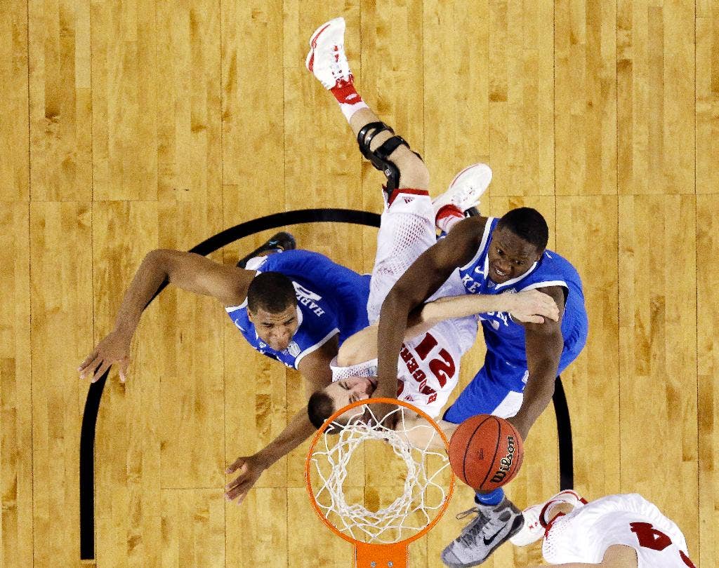 Missed late foul shot dooms Wisconsin in 7473 loss to boardcrashing