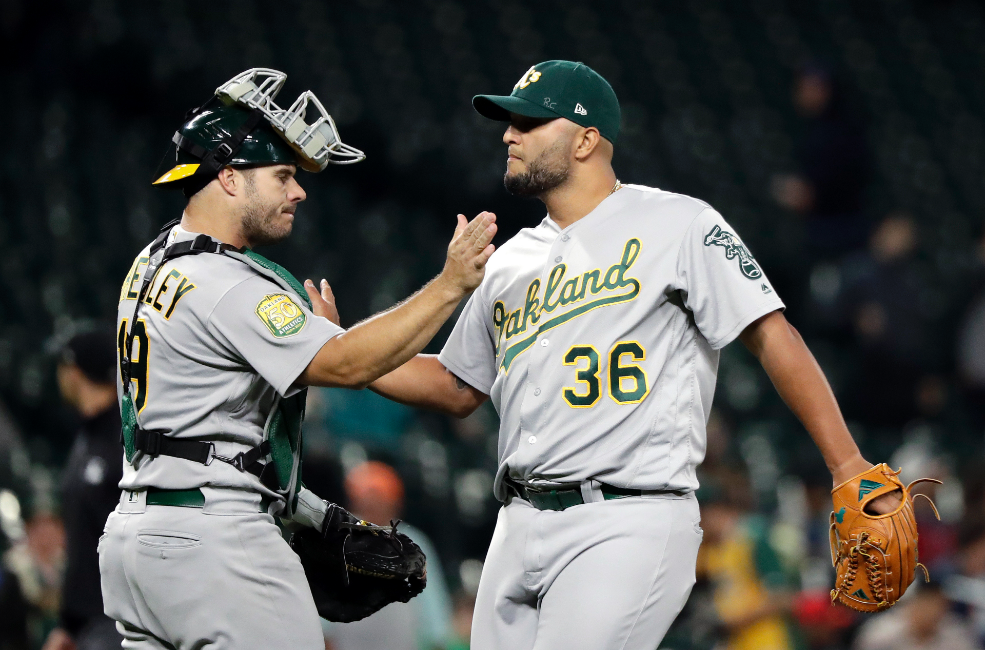 Olson's slam helps A's top Mariners 9-3, close in on Yankees