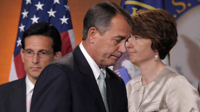 House Speaker John Boehner of Ohio, center, during a news conference with House Majority Leader Eric Cantor, R-Va., left, and Rep. Cathy McMorris Rodgers, R-Wa., right, on Capitol Hill in Washington, Friday, July 15, 2011.