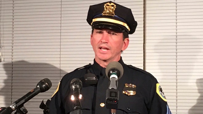 2 Iowa police officers killed in separate attacks while sitting in ...
