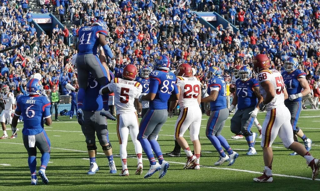 Michael Cummings helps Jayhawks roll through Iowa State, 34-14, in ...