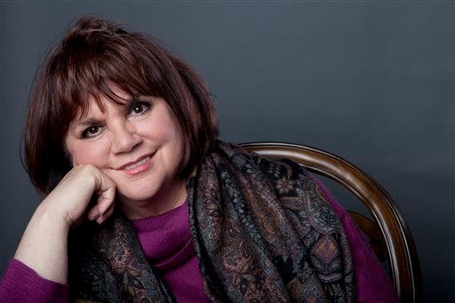 FILE - In this Sept. 17, 2013 file photo, American musician Linda Ronstadt poses in New York to promote the release of her memoir 