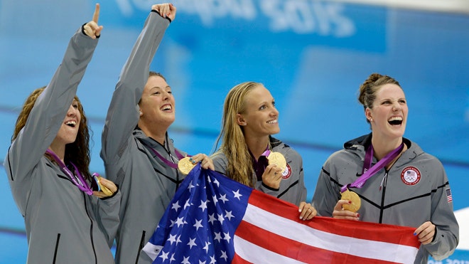 Adrian, Schmitt each win gold for US in 100-meter freestyle, 4x200 ...