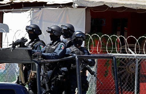Mexican Police Investigate Mass Graves