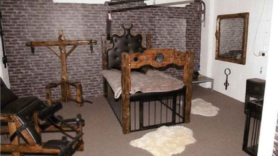 Nazi sex dungeon where gang chained whipped threatened to rape