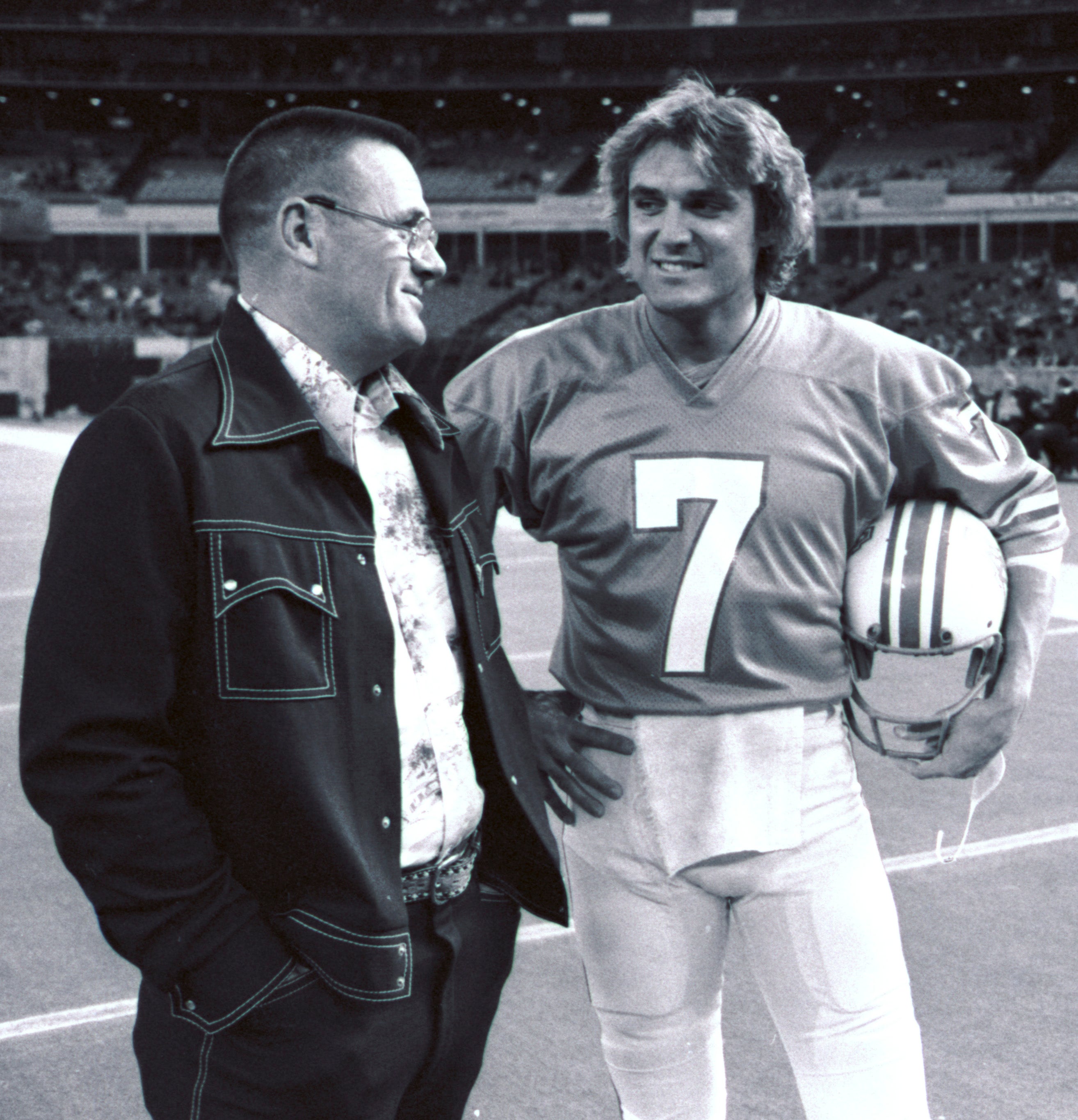 Houston Oiler quarterback Dan Pastorini (7) is sacked from the