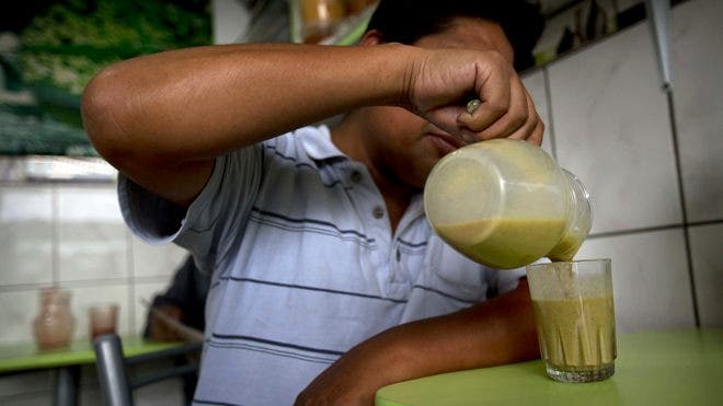 Peruvians laud benefits of drinks made with frogs