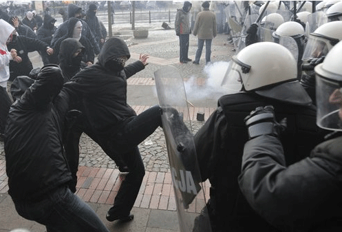 Nov. 11: Right wing extremists clash with the police at the start of the Independence March organized by right wing parties to mark Poland's Independence Day in Warsaw.