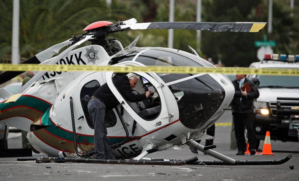 2 officers hurt in police helicopter crash on residential street