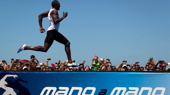 Usain Bolt Wins 150 Meter Beach Race In Brazil 