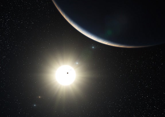Sun's twin has a nine-planet solar system -- and it's just 127
