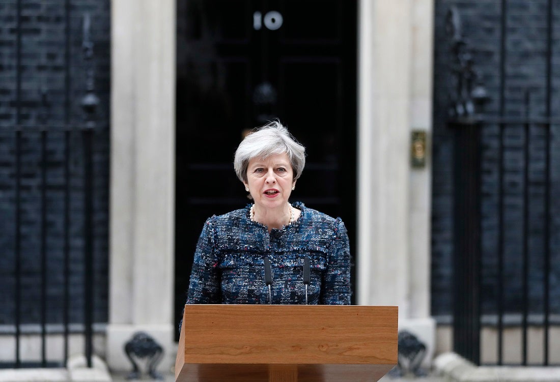 British PM Theresa May accuses EU officials of trying to meddle in UK elections