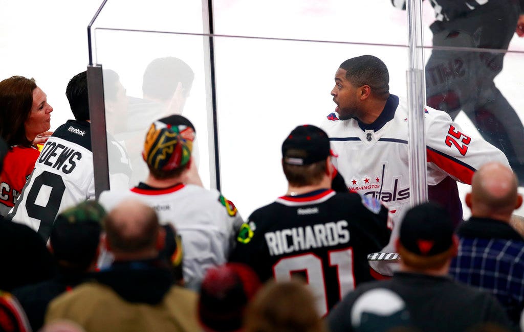 Four NHL hockey fans kicked out over racist comments toward player
