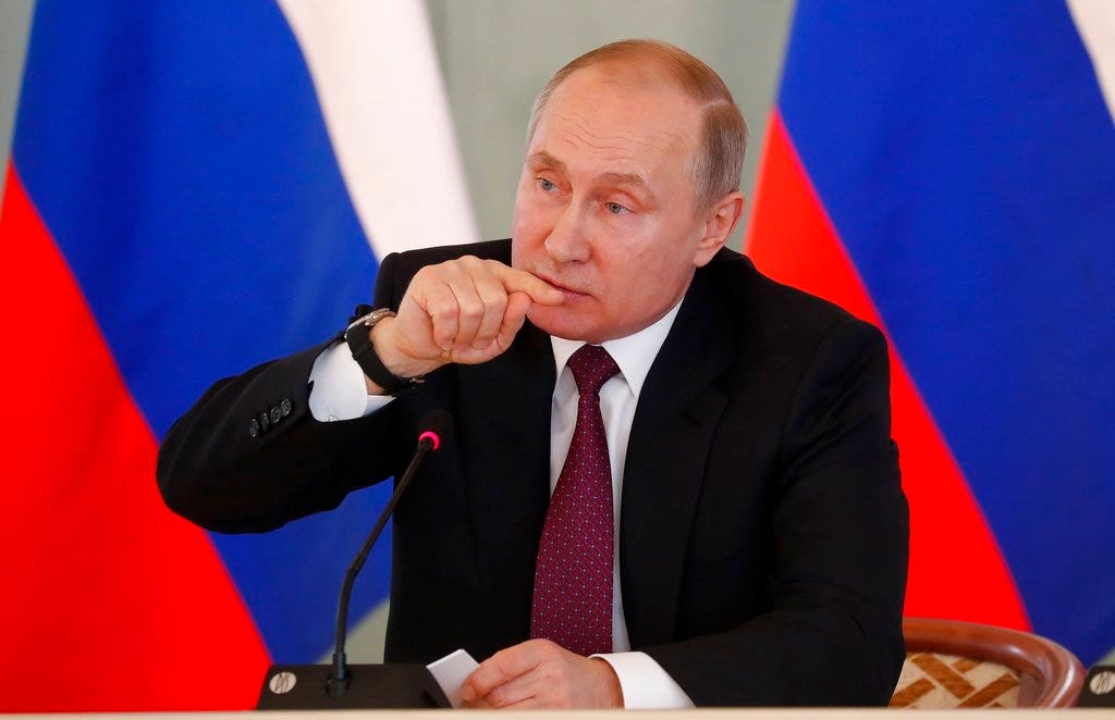 Putin dismisses claims Russia was involved in spy's poisoning as ...