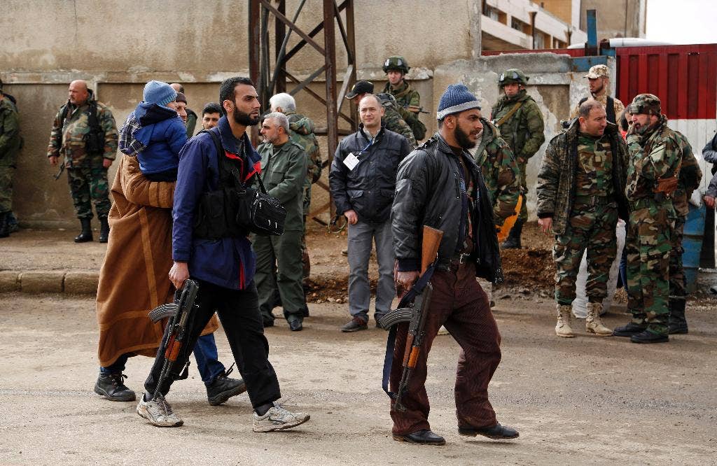 Syrian Rebels Begin Evacuation From Besieged Neighborhood