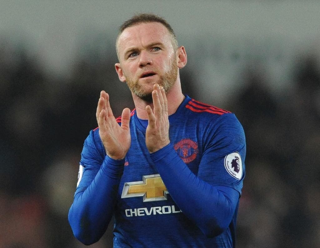 Rooney mencetak rekor gol Man United; Man City, Spurs seri