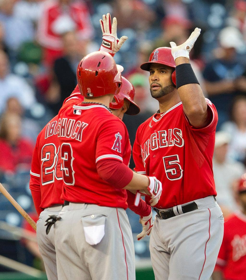 Albert Pujols mencetak homers ke-499, ke-500 dalam game yang sama untuk membantu Inggris mengalahkan Nationals 7-2