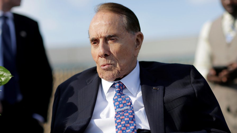 Biden visits Bob Dole at his home in DC after lung cancer was revealed