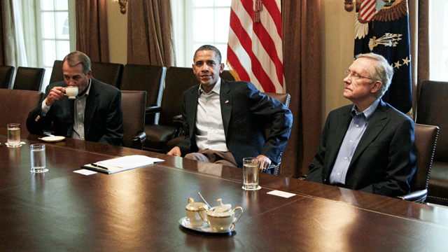 President Obama meets with Senate Majority Leader Harry Reid of Nev., and House Speaker John Boehner of Ohio, in the Cabinet Room of the White House, Saturday, July 23, 2011, in Washington, to discuss the debt.