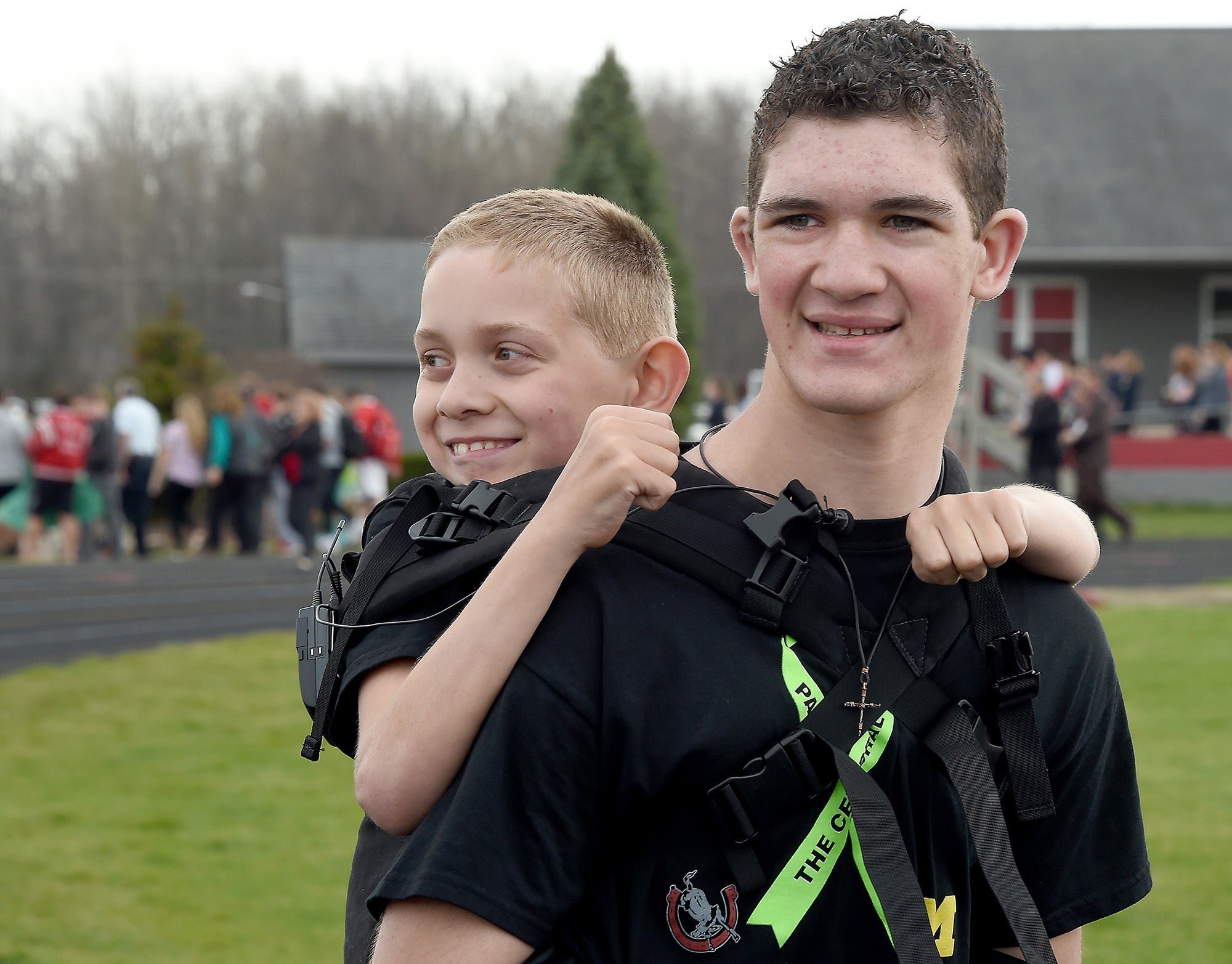 Michigan teen begins 111-mile walk with brother on back | Fox News