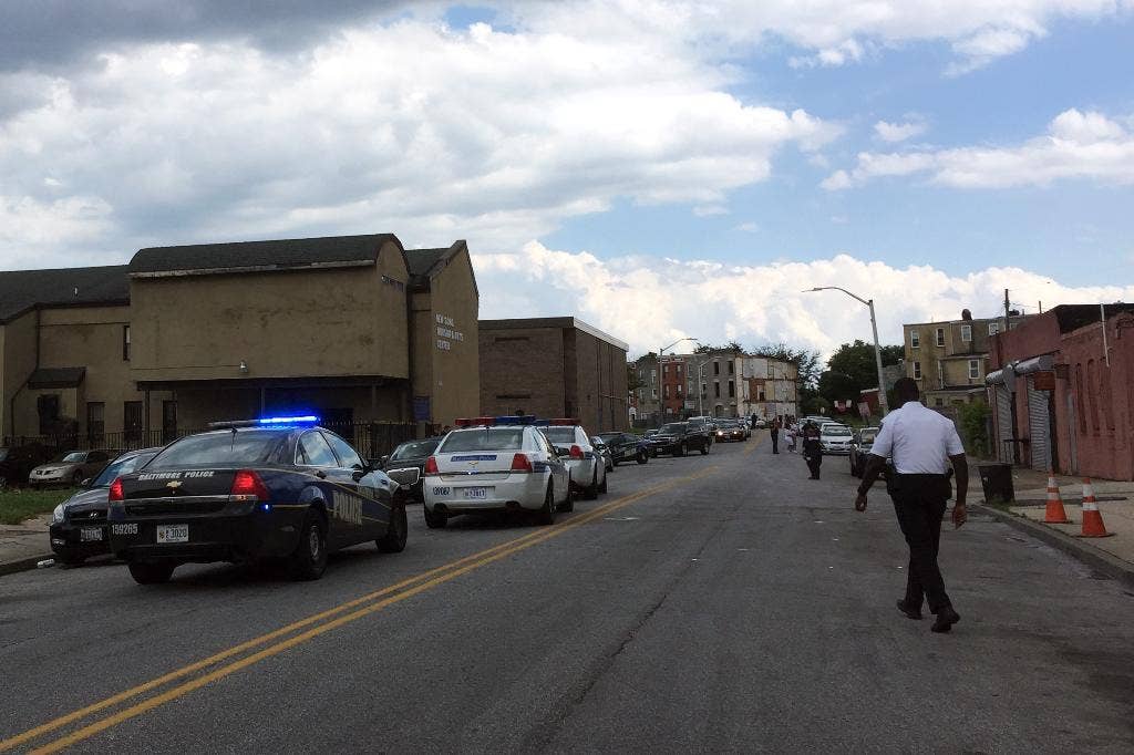 Man shoots father at Baltimore church after brother's funeral, cops say